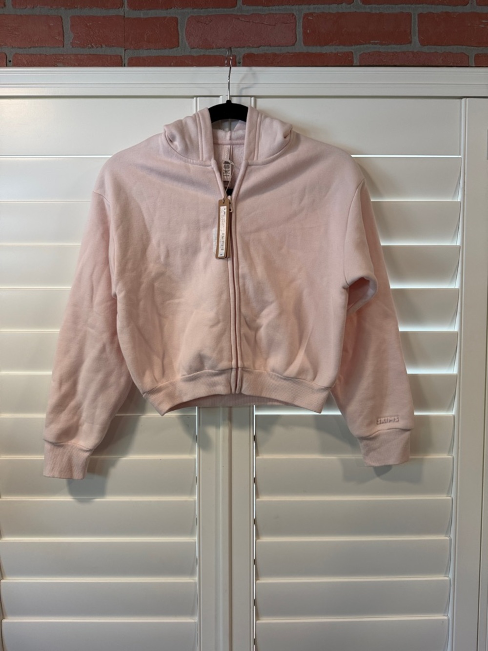 SKIMS Pale Pink Cropped Hoodie with Embroidered Logo